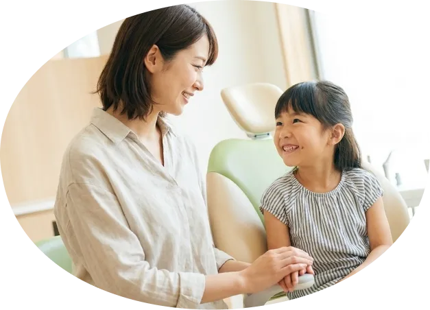 お子さまと保護者の診療風景